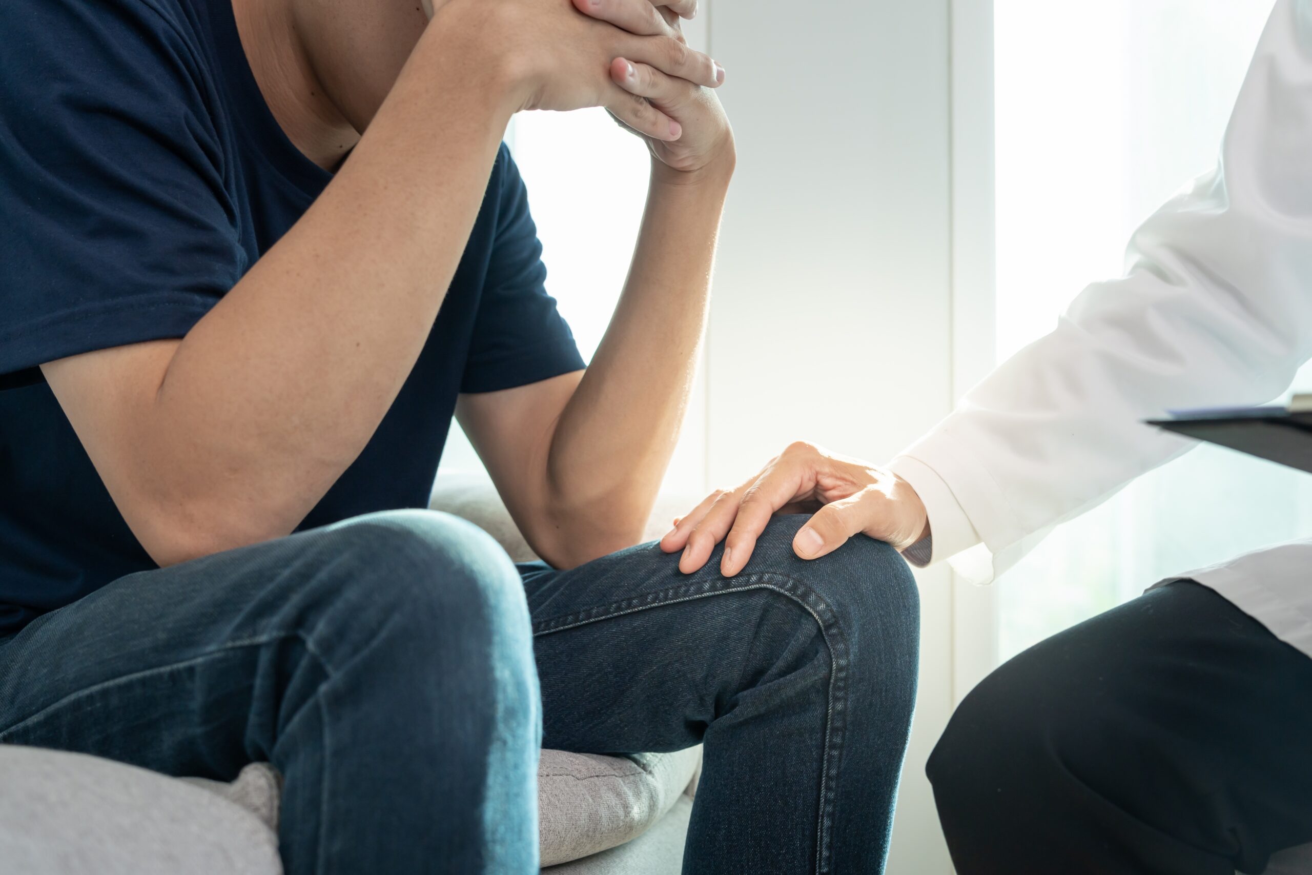 Man talking to therapist about cocaine rehab.